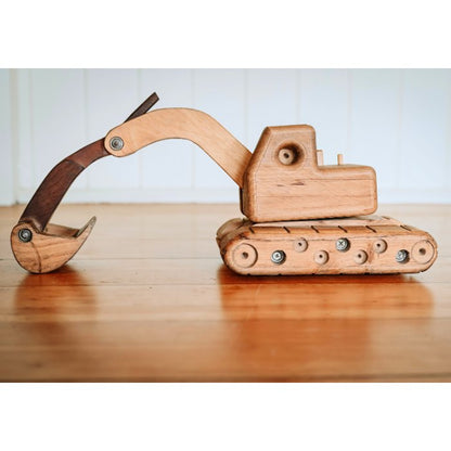 Big luxury Handmade Wooden Toy Excavator Digger. Heirloom. Durable. Functional Arm, boom, blade. Rotating Cab. Queenslander Decor Photoshoot. Arm extended