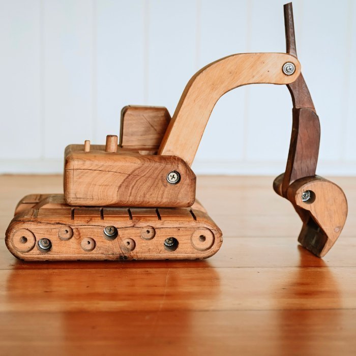 Big luxury Handmade Wooden Toy Excavator Digger. Heirloom. Durable. Functional Arm, boom, blade. Rotating Cab. Queenslander Decor Photoshoot. Realistic.